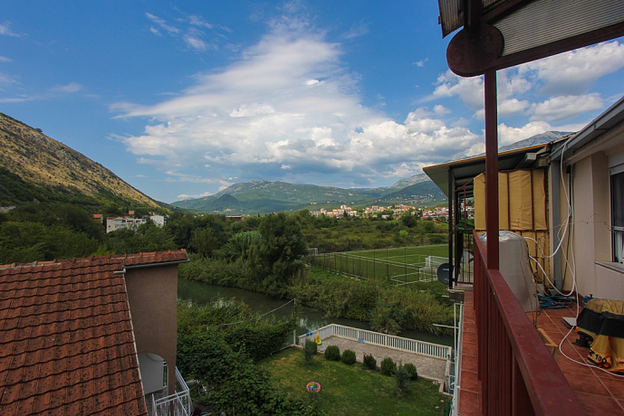 Двухкомнатная квартира в Игало с видом на реку и горы