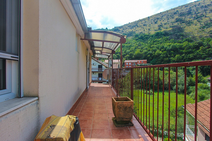 Двухкомнатная квартира в Игало с видом на реку и горы